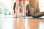 Asian Woman Doing Yoga Indoors Stock Photo