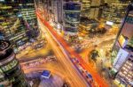 Cityscape Of South Korea. Night Traffic Speeds Through An Intersection In The Gangnam District Of Seoul,south Korea Stock Photo