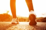 Woman Exercising Outdoor At Sunset  Stock Photo