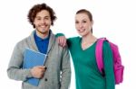 College Girl Resting Her Arm On Friends Shoulder Stock Photo