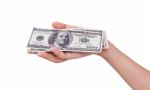 Hand Holding Dollars Stock Photo