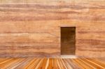 Stone Wall With Door And Wood Floor In Front Off Stock Photo