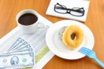 Sugar And Chocolate Donut On Working Table Stock Photo