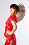 Chinese Model In Traditional Cheongsam Dress Stock Photo