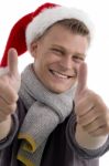 Man Wearing Santa Hat and Thumb Up Stock Photo