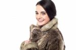 Stylish Young Girl In Fur Jacket Stock Photo