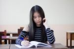 Portrait Of Thai Teen Beautiful Girl Writing Book Stock Photo