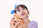 Little Girl Holding A Sea Shell Stock Photo