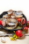 Fresh Clams On An Iron Skillet Stock Photo