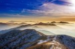 Winter Landscape With Sunset And Foggy In Deogyusan Mountains, South Korea Stock Photo