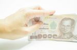 Hand Hold On Thai Money Banknote Stock Photo