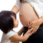 Wonderful Pregnant Woman And Her Children Stock Photo