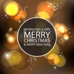 The Merry Christmas And Happy New Year Gold Bokeh Background Stock Photo