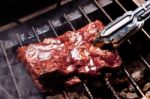 BBQ Ribs On Grill  Stock Photo