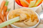 Fresh Hummus Dip With Raw Carrot And Celery Stock Photo