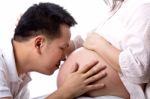 Lovely Pregnant With Her Husband Used Hand Touched Torso Stock Photo