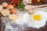 Ingredients Preparation Spaghetti With Eggs, Tomatoes Herbs And Spices Stock Photo