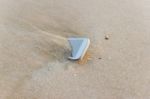 Mobile Phone Floated To The Sea At The Beach Stock Photo