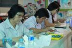 Activity Of Teaching Elementary Students. Elementary Students Are Test Lesson. The Students Intend Exam Stock Photo