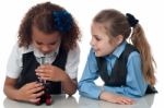 Two Pretty School Girls With Microscope Stock Photo