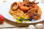 Italian Seafood Spaghetti Pasta On Red Tomato Sauce Stock Photo