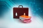 Leather Briefcase And Books Stock Photo