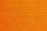 Close Up Of Orange Fabric Texture For Background Stock Photo