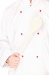 Male Chef Holding Mixing Spoon Stock Photo