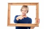 Angry Lady Holding The Wooden Frame Stock Photo