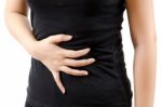 Woman Suffering From Abdominal Pain Stock Photo