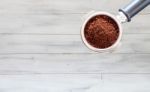 Coffee Grind In Group On White Wooden Background Stock Photo