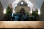 Selected Focus Empty Brown Wooden Table And Coffee Shop Or Resta Stock Photo