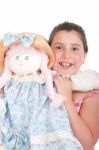 Little Girl With Doll Stock Photo