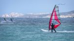 Windsurfing At Porto Pollo In Sardinia Stock Photo