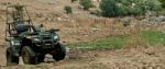 ATV Standing In Muddy Stock Photo