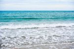 Sand Beach With Blue Ocean Stock Photo