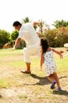 Dad And Daughter Playing Airplane Stock Photo