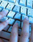 Hands On Computer Keyboard Stock Photo