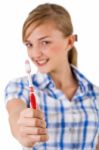 Young Women Showing The Toothbrush Stock Photo