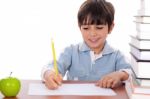 School Boy Doing His Homework Stock Photo