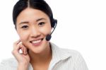 Cute Asian Female As Help Desk Operator Stock Photo