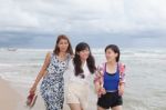 Portrait Of Young Beautiful Asian Woman Friend Relaxing Happy Emotion On Sea Beach Vacation Holiday Stock Photo