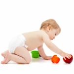 Cute Infant Boy With Apple Stock Photo