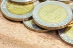 Coins Of Thailand. Wat Arun Temple In Bangkok, Thailand, Depicted In The Thai Ten Baht Coin Stock Photo