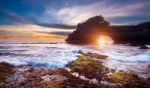 Tanah Lot Temple At Sunset In Bali, Indonesia.(dark)seascape Stock Photo