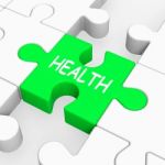 Health Puzzle Shows Medical Care And Wellbeing Stock Photo