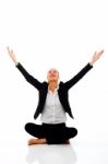 Businesswoman Doing Yoga Stock Photo