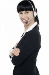 Friendly Female Telephone Operator At Your Service Stock Photo