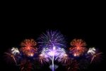Group Of Colorful Fireworks On Dark Background Stock Photo