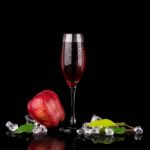 Champagne Glass With Apple Stock Photo